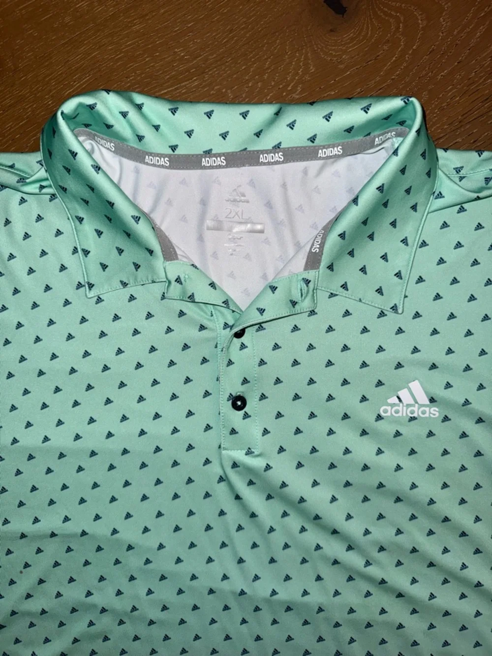 adidas Men's Mint Green Golf Polo with Small Black Triangle Motif‎